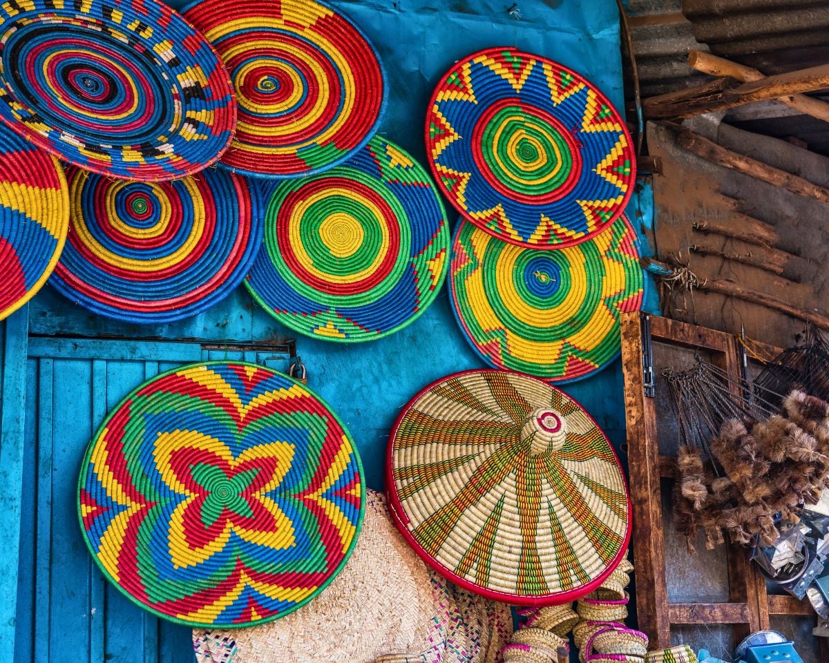 Woven mesob baskets stacked at an Addis Ababa market