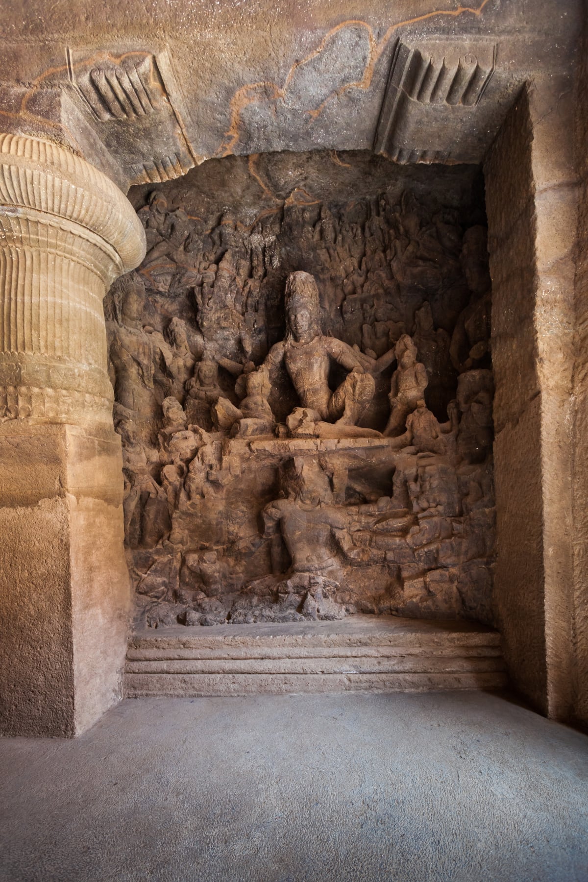 A carved deity inside the caves of Elephanta Island
