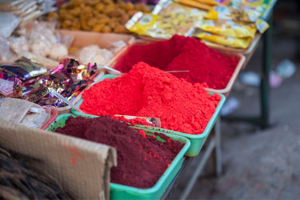 Chilli and spice piled at an Udaipur market